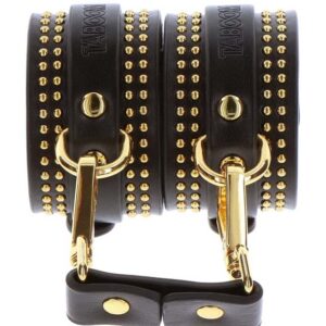 Svarta Vogue Ankle Cuffs vristfängsel i veganskt läder med gulddetaljer